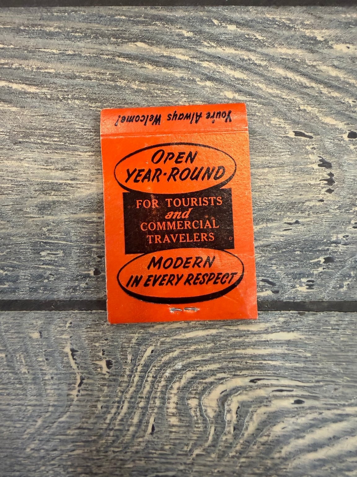 Rainbow Motel Hastings Nebr. Mid-Century Orange Black Advertising Matchbook