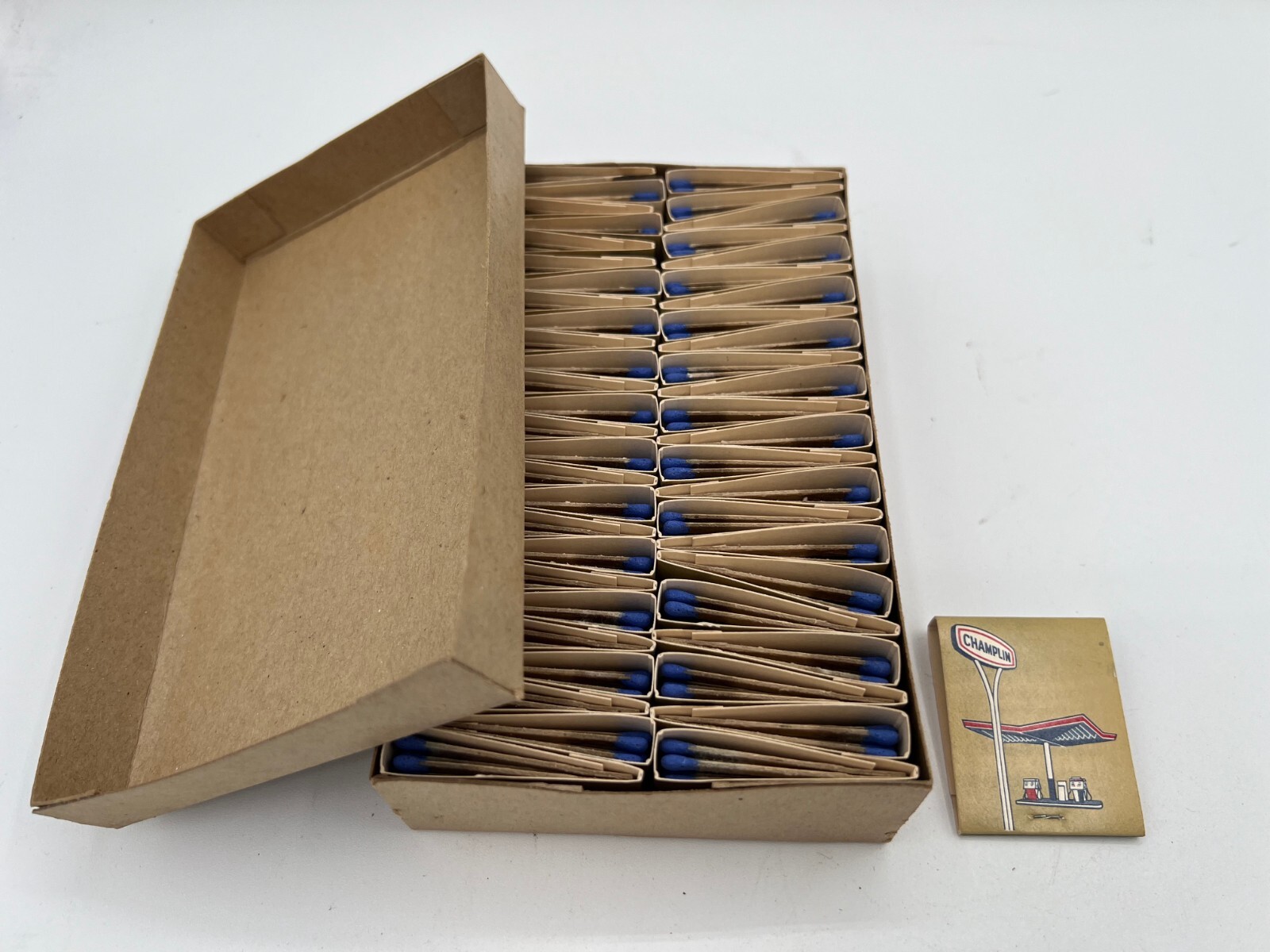 1 CASE (50) VINTAGE CHAMPLIN MATCHBOOKS – CHAMPLIN KEEPS THINGS MOVING!