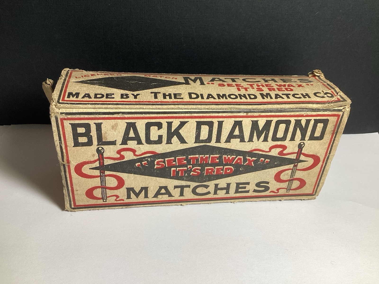 “RARE” BLACK DIAMOND MATCHES CARDBOARD MATCH BOX “SEE THE WAX IT’S RED”